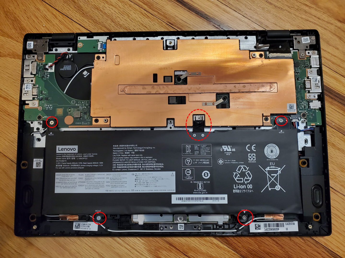 photo of a Lenovo 14w 81MQ Laptop with the bottom cover removed