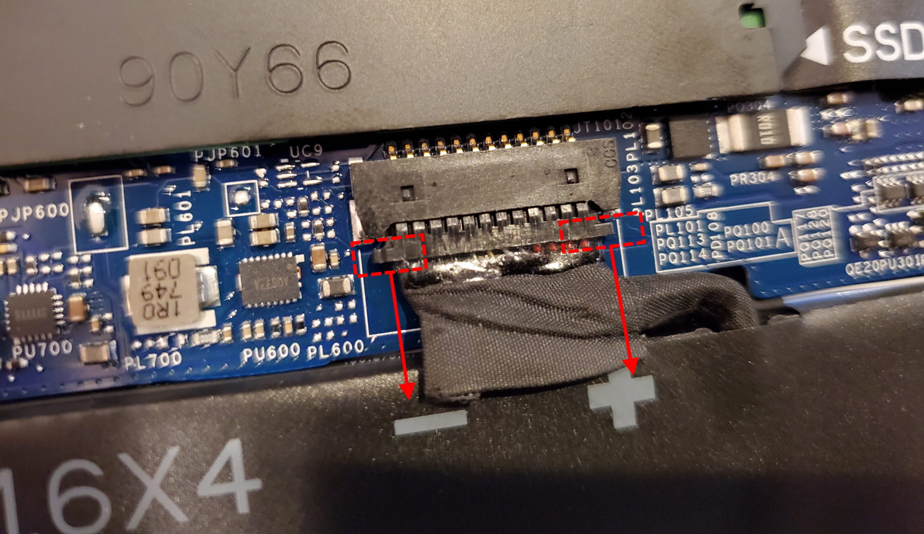 showing the tabs of the battery connector to use to unplug the cable, as part of how to do a Dell XPS 13 9370 SSD Upgrade