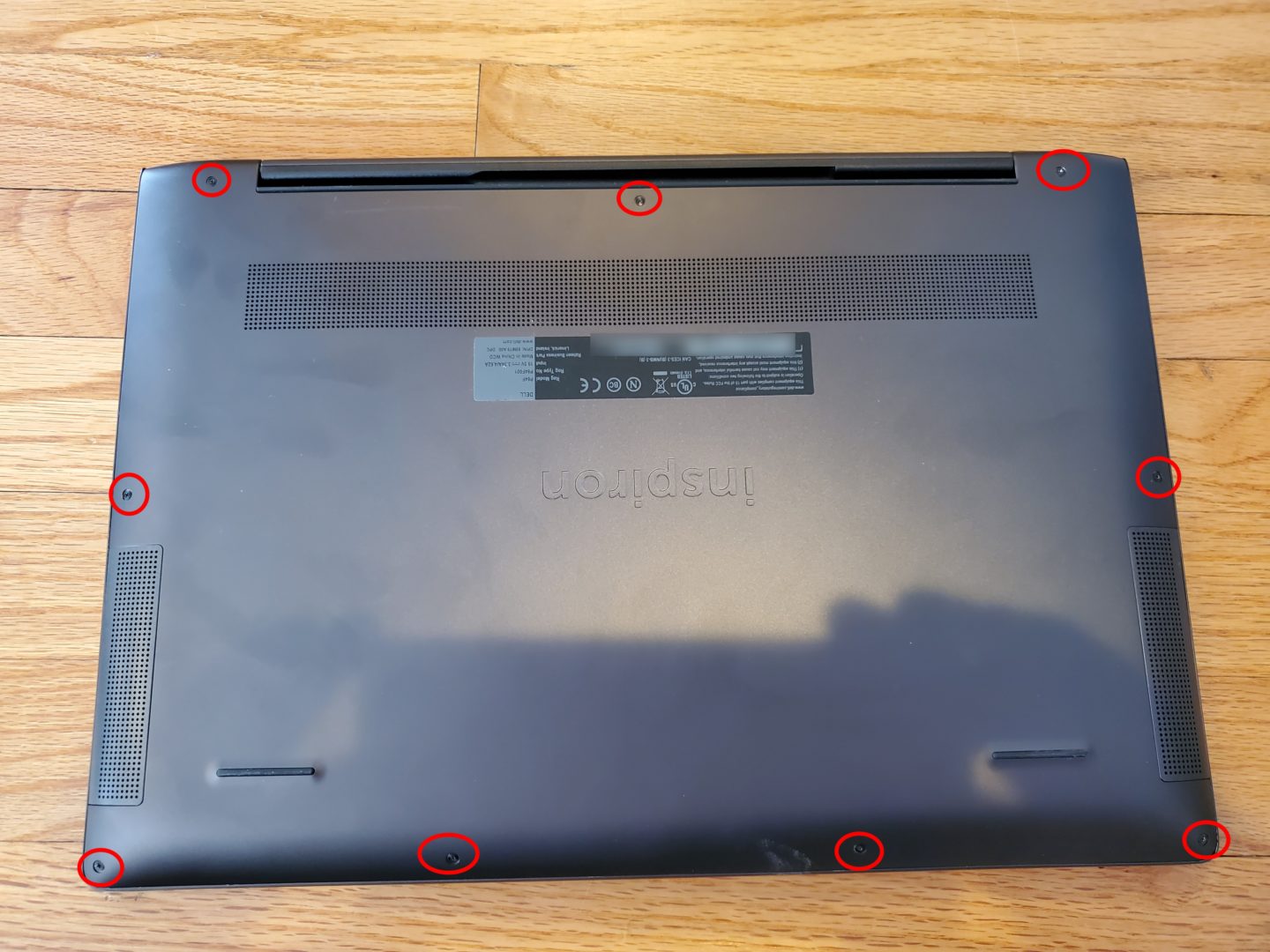 screw locations of the bottom cover, part of the Upgrade a Dell Inspiron 15 7000 2-in-1 review