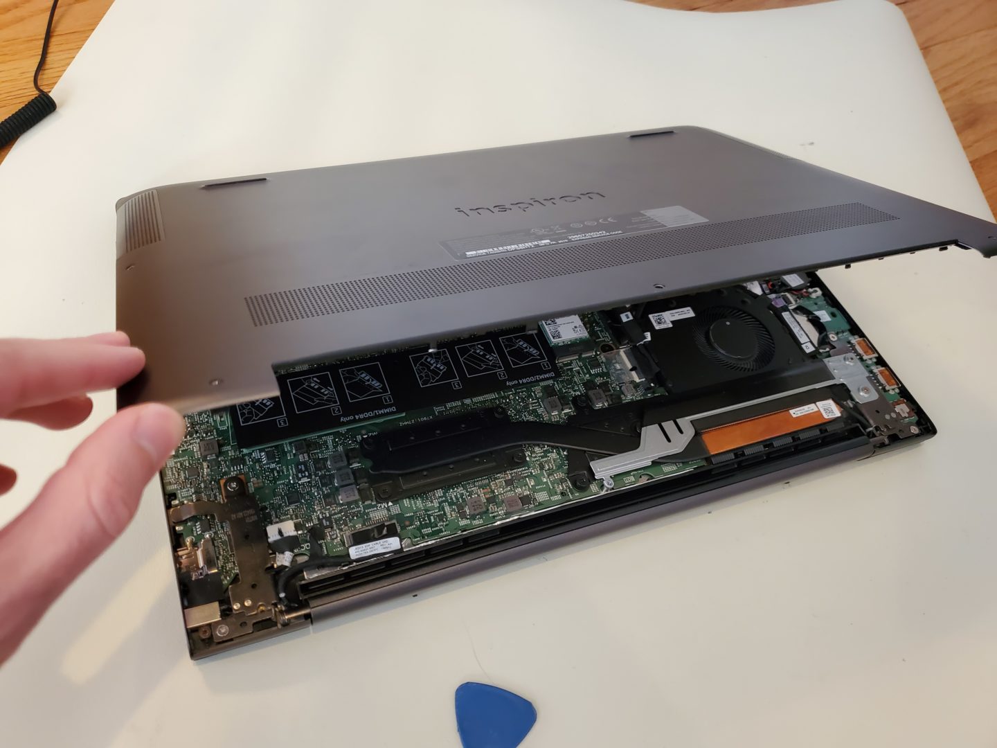 showing the bottom cover removed from a dell inspiron 15 7000 2-in-1