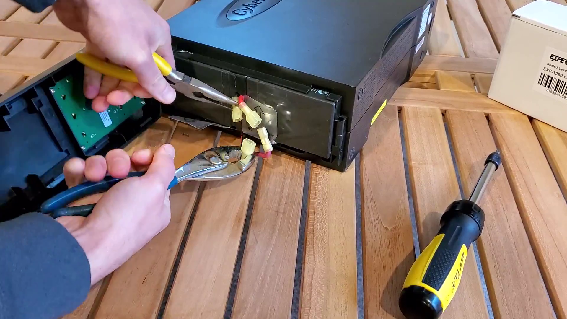 unplugging the battery cables, part of the How to Replace a CyberPower 1500AV UPS Battery article