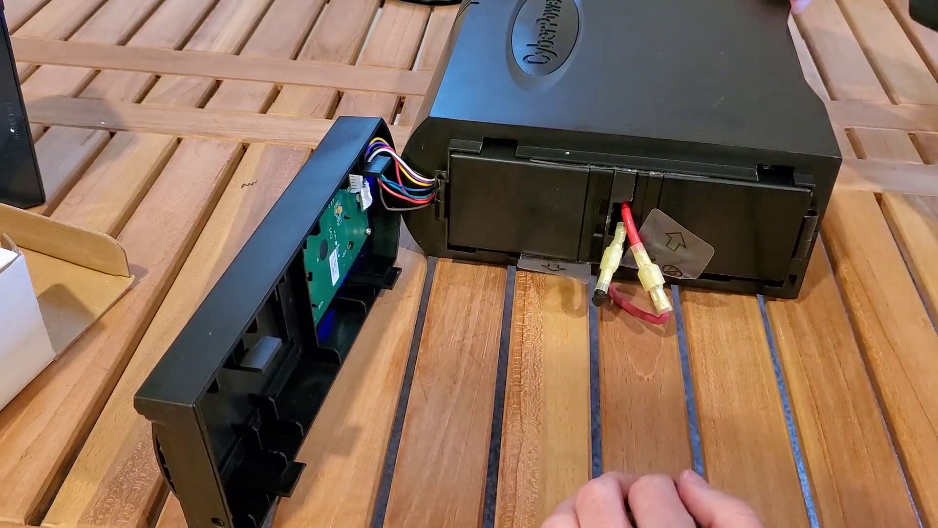 showing the new batteries installed and wires reconnected, part of the How to Replace a CyberPower 1500AV UPS Battery article