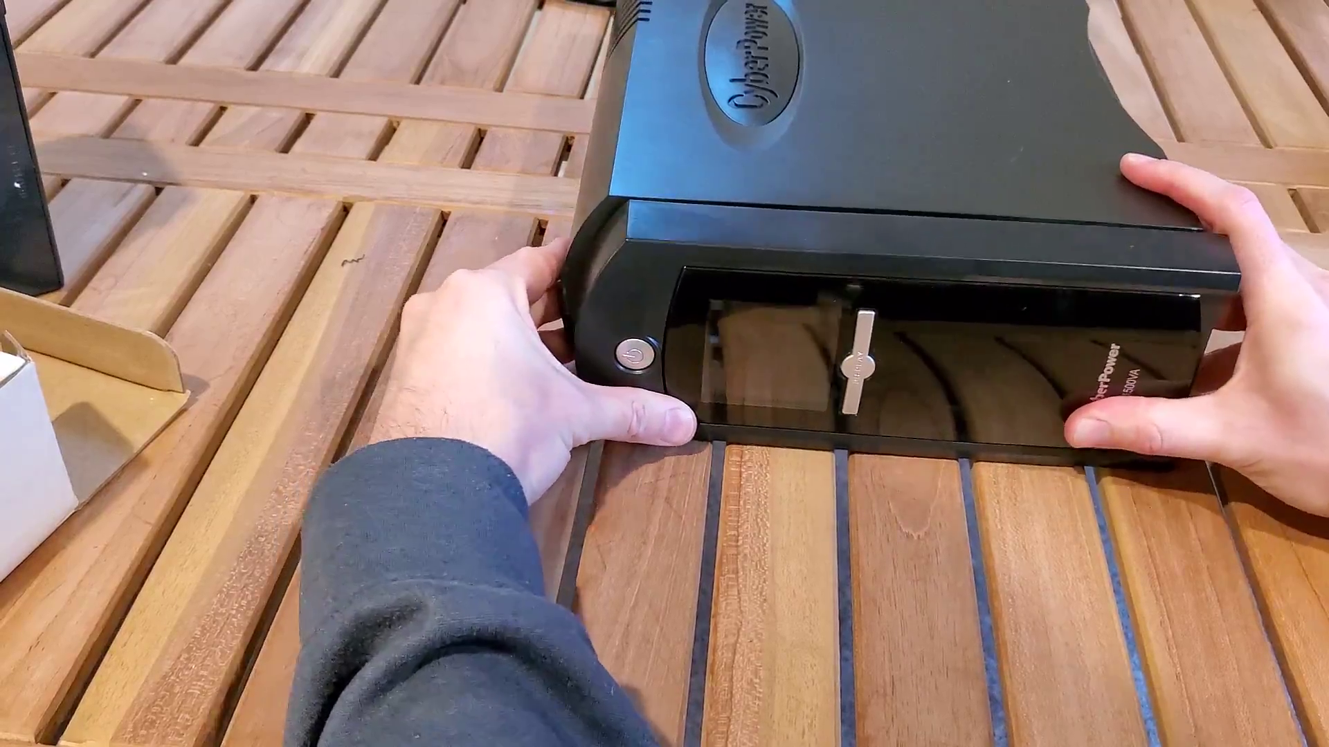 sliding the front panel back on, part of the How to Replace a CyberPower 1500AV UPS Battery article