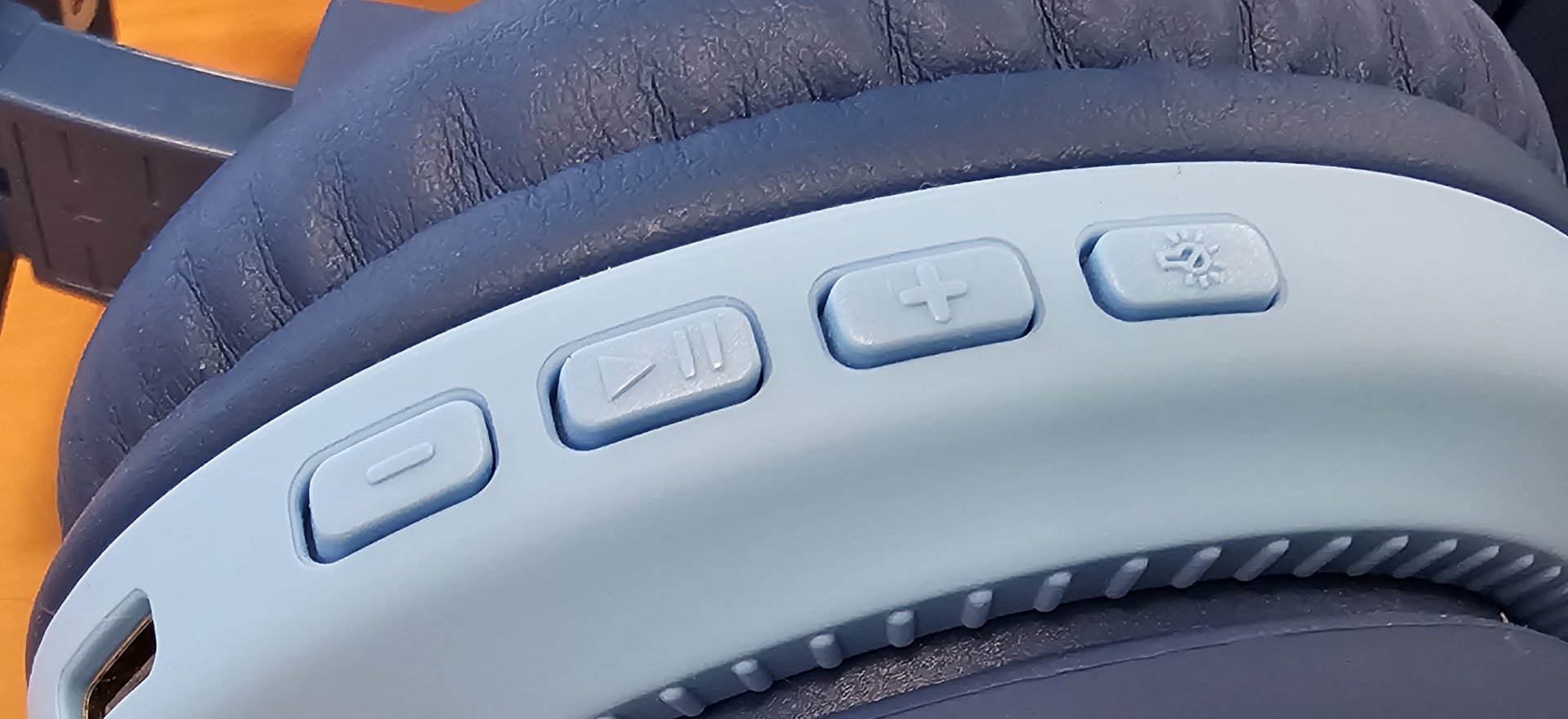 the volume up and down buttons, used for pairing an iclever bth12 bluetooth headset